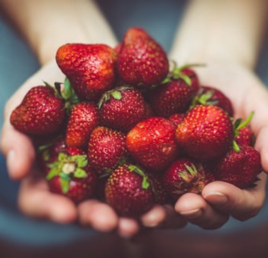 Hands Full of Strawberries